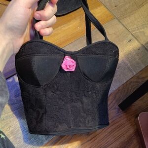 Black Corset-Style Handbag with Pink Rose Accent
